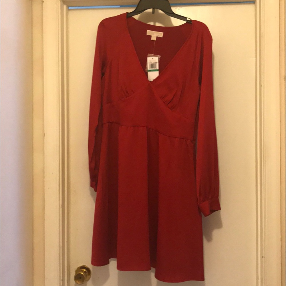 Never worn, tags still on! Size L MK dress